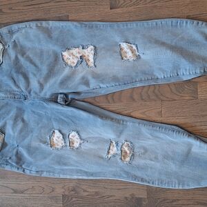 Women's Distressed Blue Jeans